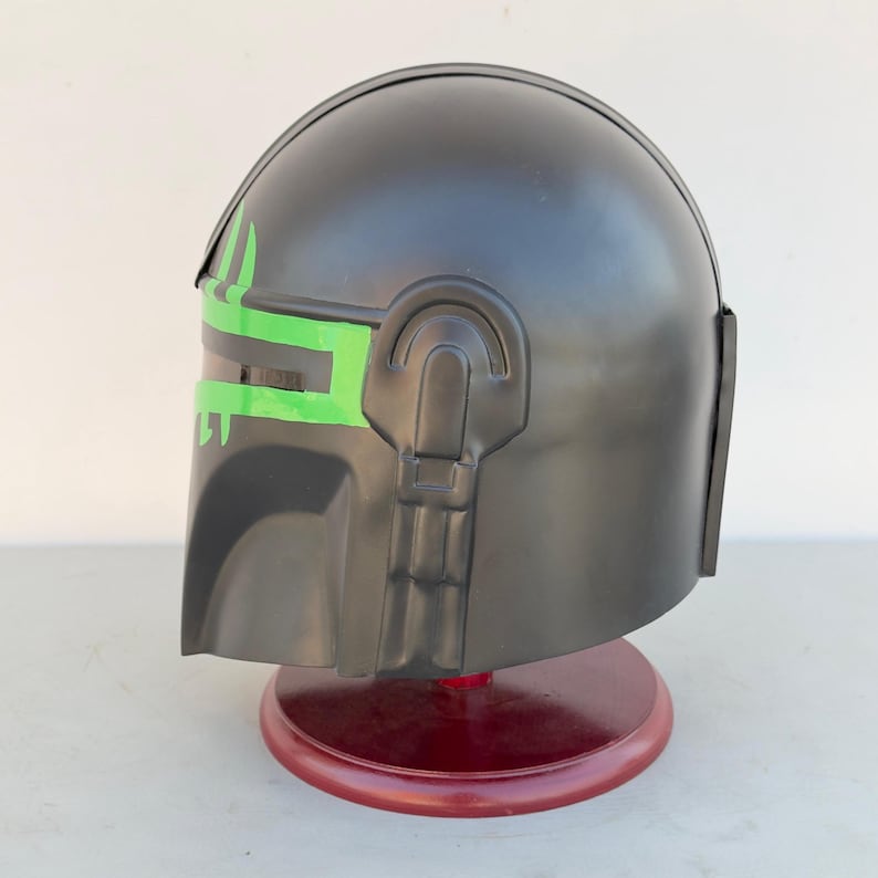 Handmade Mandalorian helmet displayed as Star Wars prop for cosplay and collectors