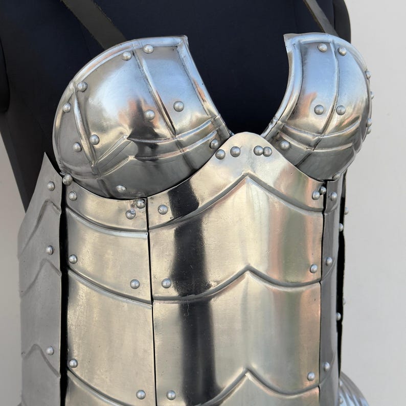 Adjustable brown and black leather straps on fantasy steel cuirass corset set