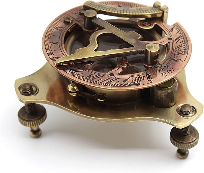 Adjustable screw legs on nautical brass compass for precise positioning