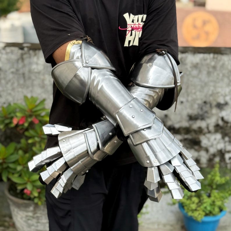 Adjustable strap steel battle gauntlets providing a comfortable and secure fit for reenactments