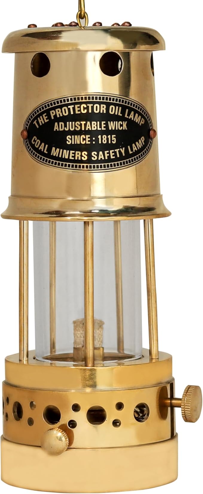Close-up of adjustable wick on vintage brass protector oil lamp for flame control
