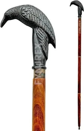 Close-up of aluminum crow handle on Victorian style walking stick