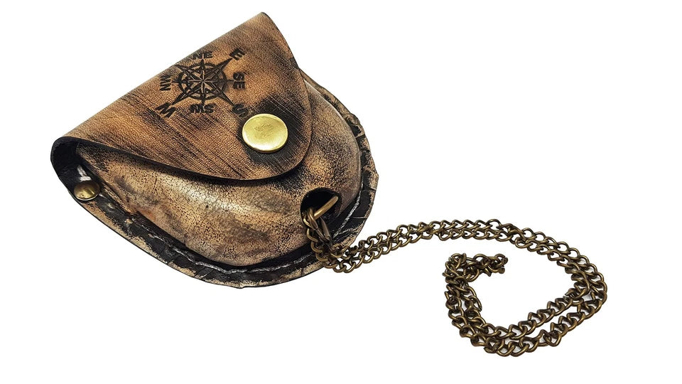 Artisans Hub brass nautical compass fitting perfectly in a pocket with leather case