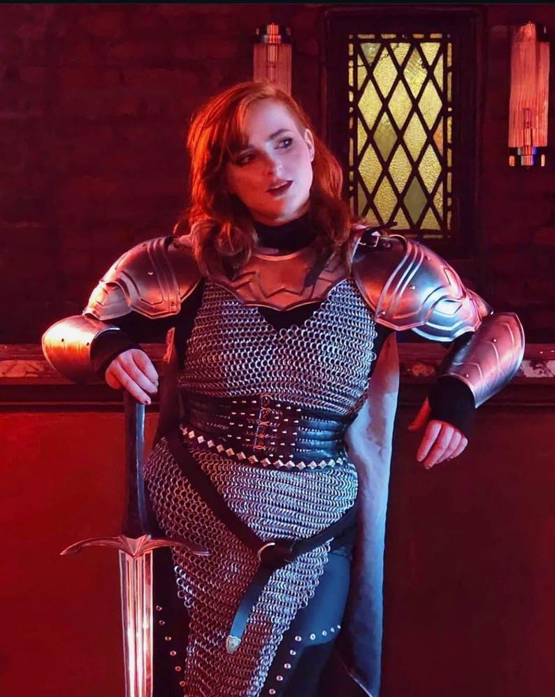 Rare view of lady warrior half body armor with bracers and layered design