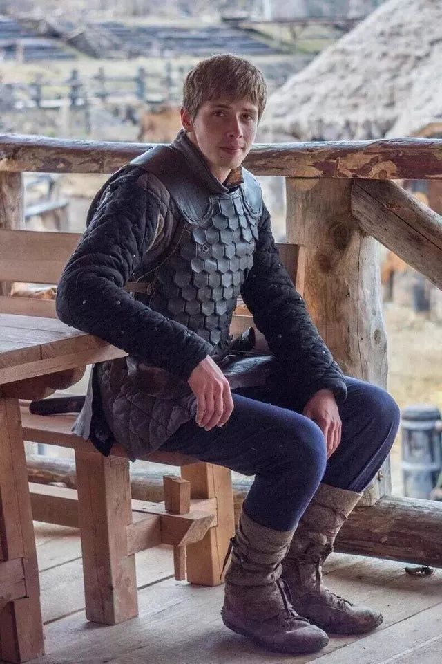 Model wearing Artisans Hub genuine leather Viking knight armor breastplate