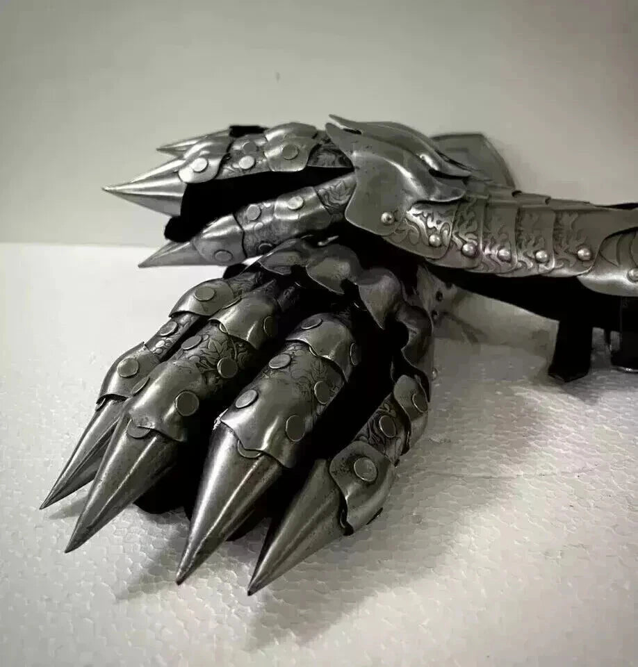 Detailed view of Artisans Hub medieval gauntlets highlighting black antique finish and fine steel craftsmanship