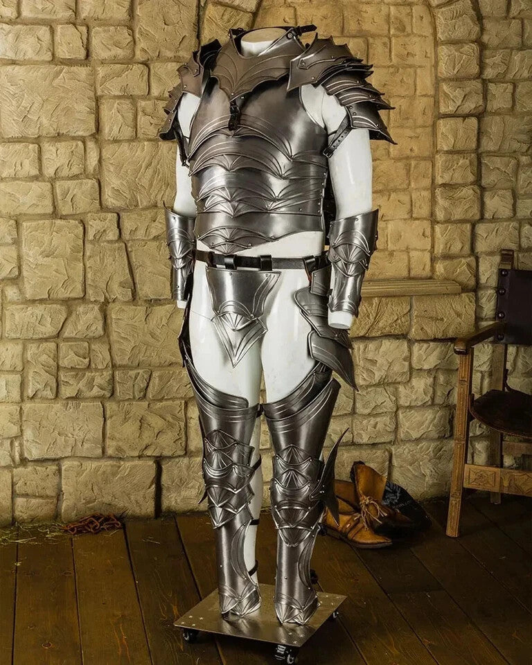 Close-up of Balthasar knight armor showing helmet and shoulder pauldrons, crafted from 18-gauge steel for medieval cosplay or reenactments by Artisans Hub.