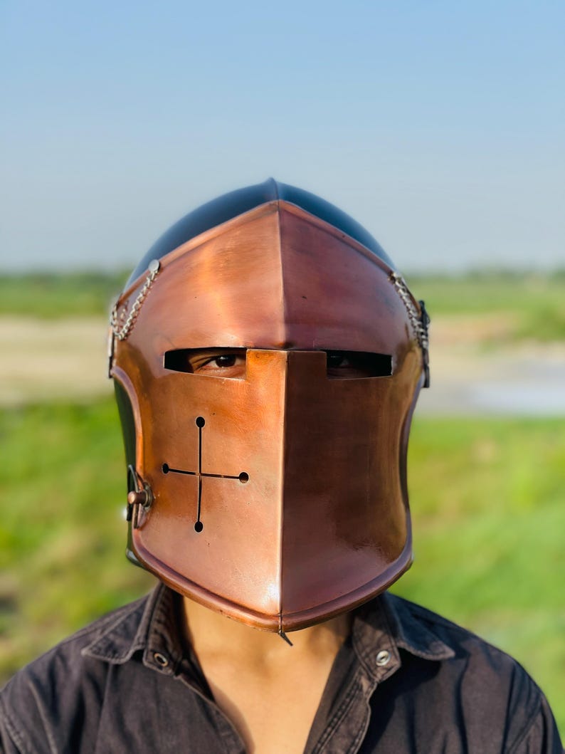 Side profile of the Barbuta Visored Helmet made from 18g mild steel.