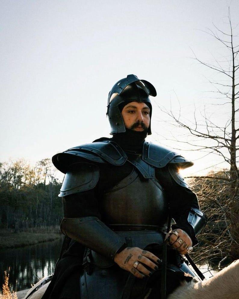 Fully wearable black full plate knight armor set displayed for medieval reenactment or home decor.