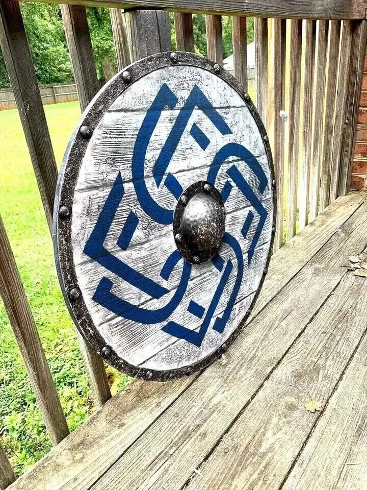 Close-up of battle-worn steel detailing on Viking shield surface