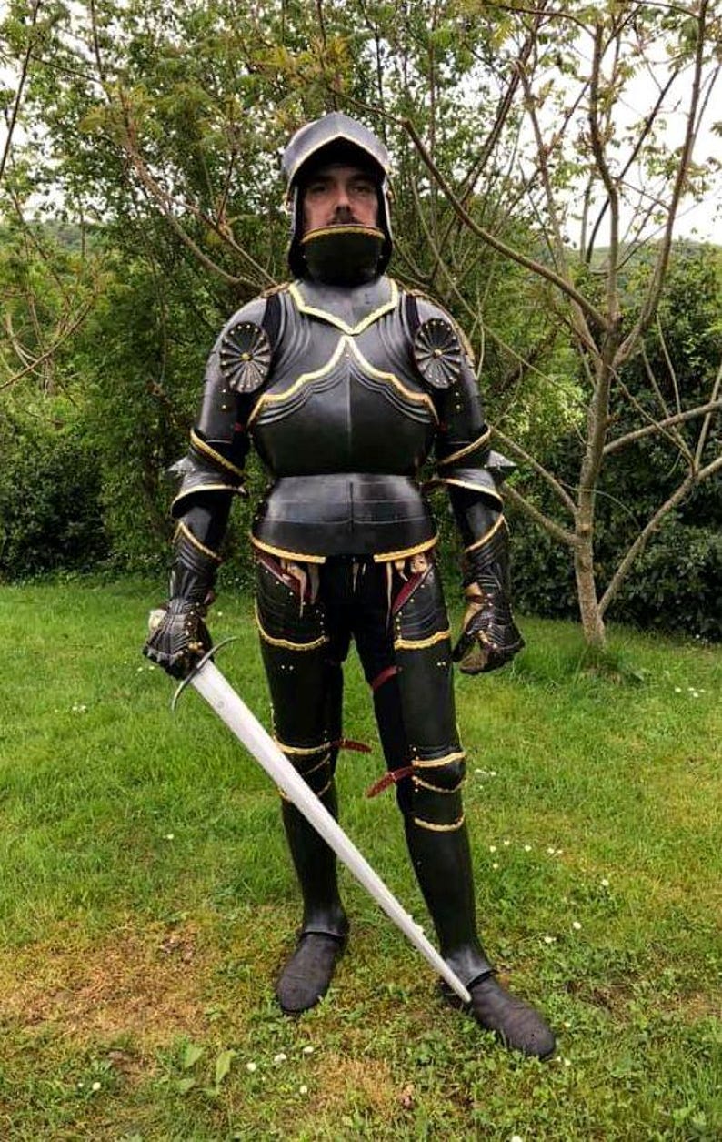 Side profile of Black Lion Gothic Knight Armor showing articulated limbs and leather straps