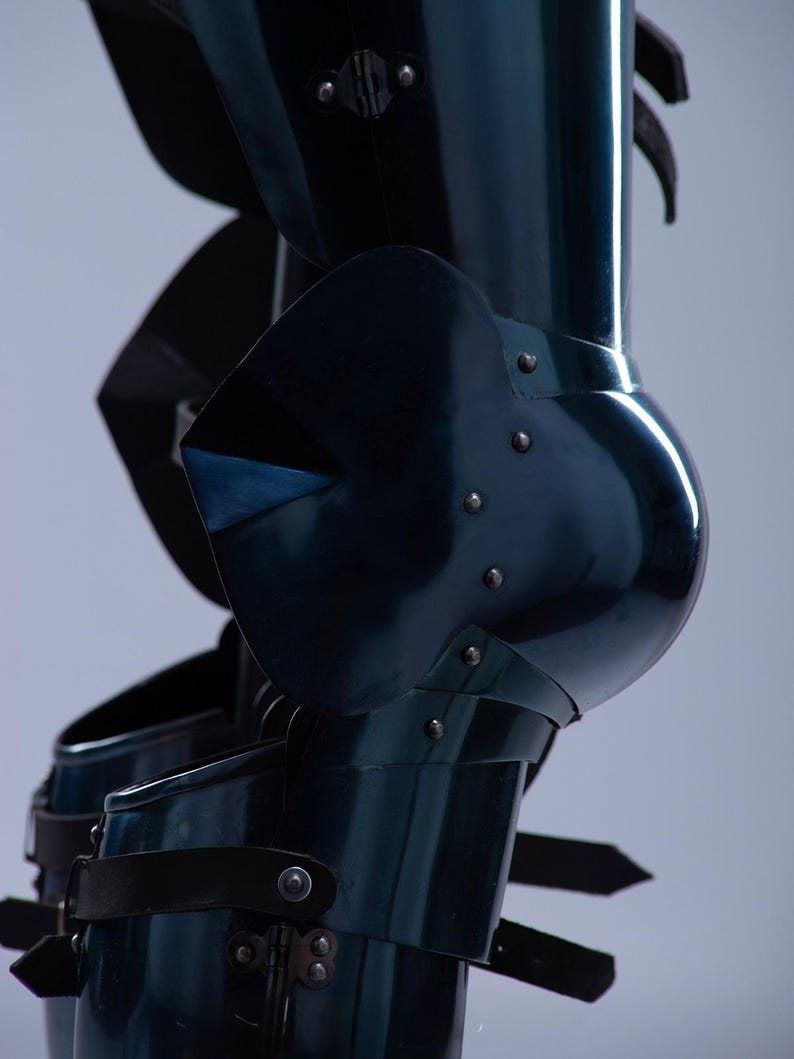 Side view of blued leg armor greaves for roleplay and reenactment