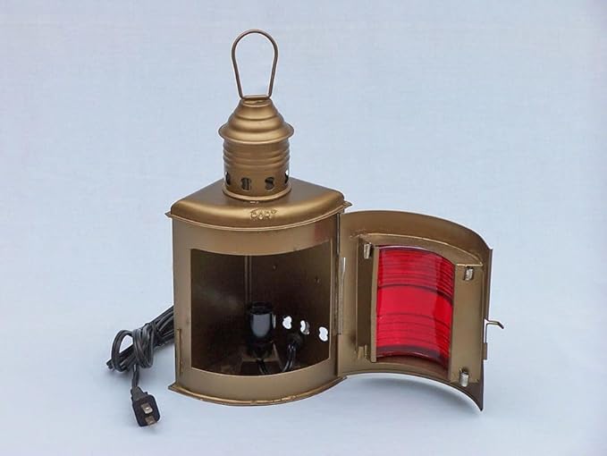 Red and green lenses on antique electric lanterns used as boat navigation lights