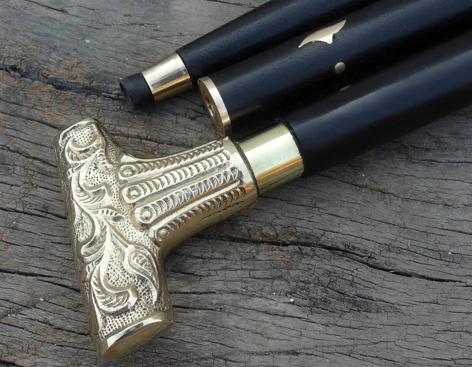 Close-up of brass silver Victorian handle on antique walking stick