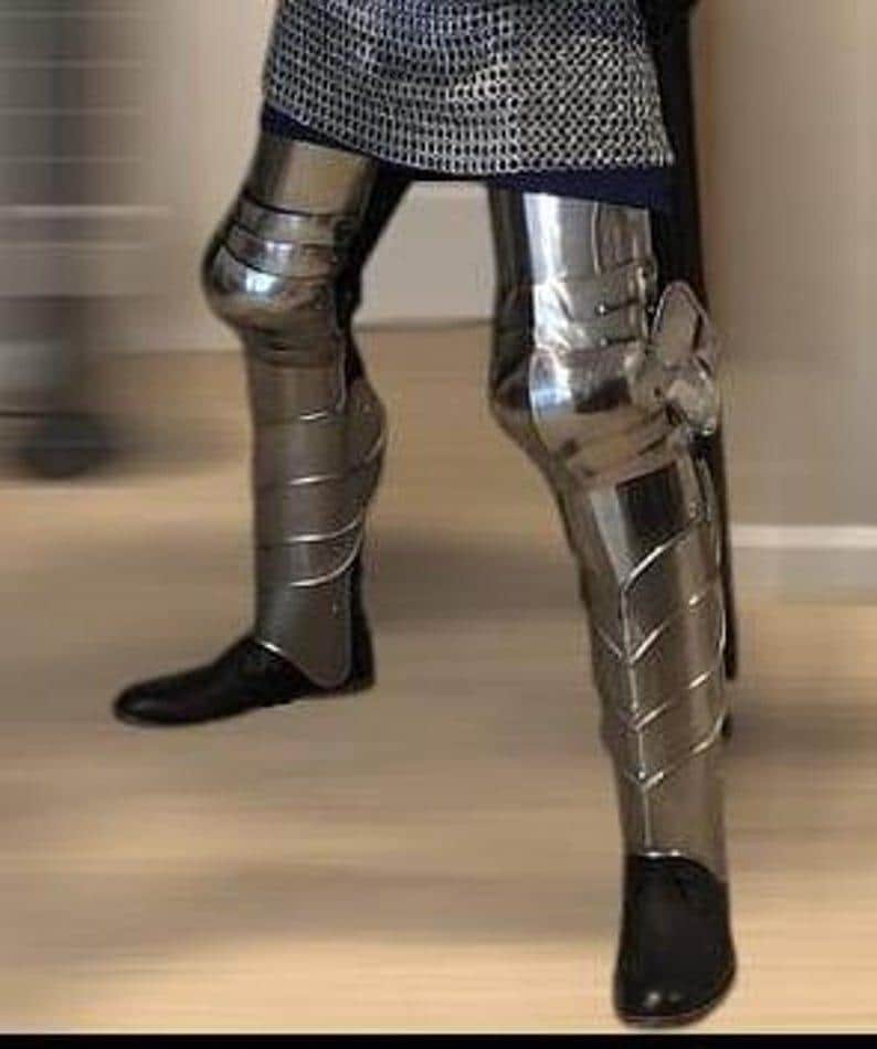 Chainmail hauberk worn under full plate armor for added authenticity and layered protection.