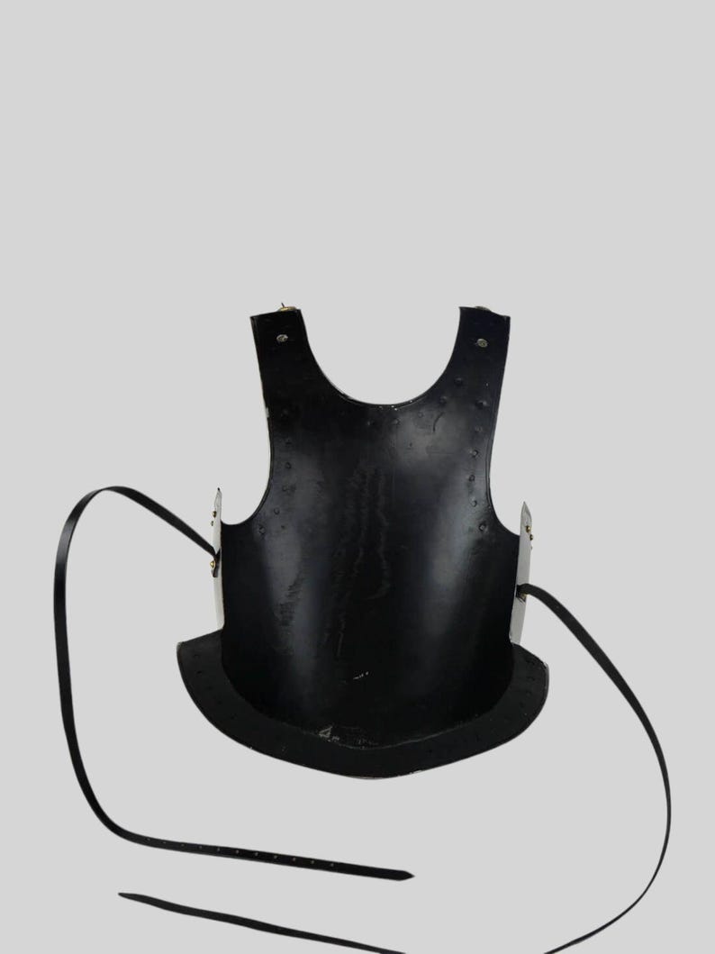 Closeup of medieval cosplay armor cuirass with etched design for fantasy king or knight costume