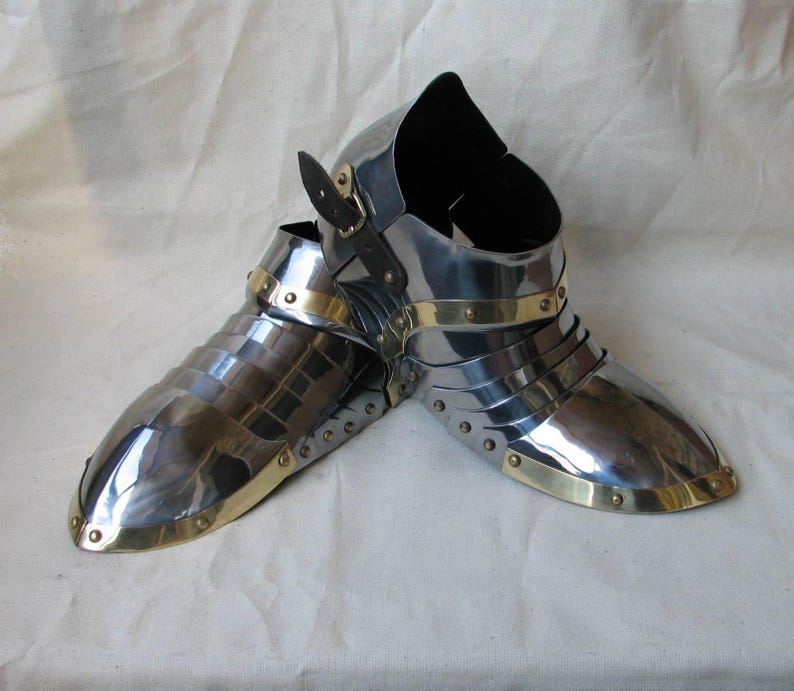 Complete set of knight brass sabatons with black leather belts and rust-free finish
