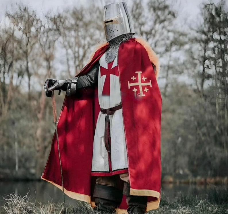 Chainmail dress of a Crusader knight featuring the iconic red cross emblem.