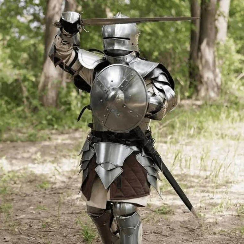 Display of 18-gauge steel medieval armor set showing all included components