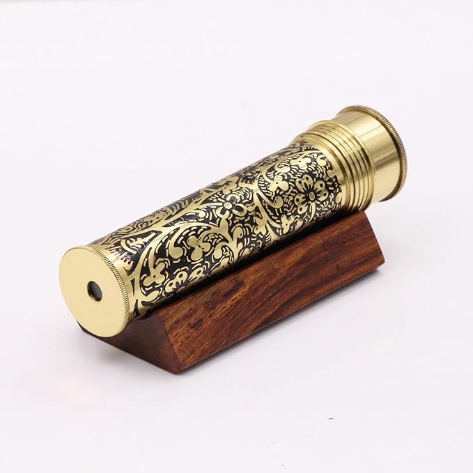 Close-up of dry object chamber filled with lampworking glass beads in brass kaleidoscope