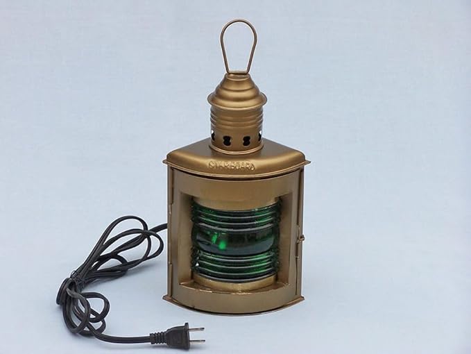Pair of electric ship lanterns displayed side by side on a rustic wood table