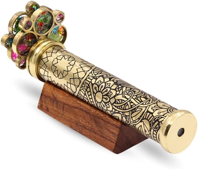 Etched floral brass kaleidoscope with two separate turning wheels showing colorful glass beads