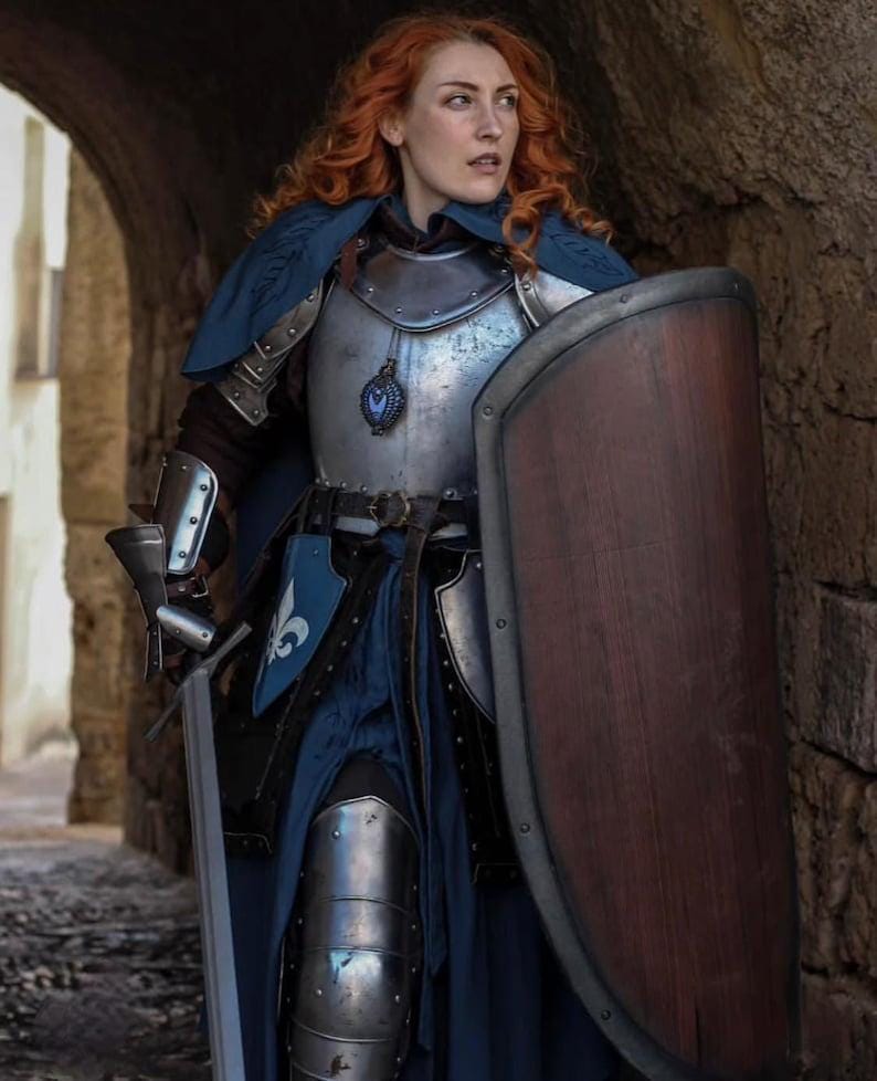 Articulated steel bracers and gauntlets with adjustable leather straps, crafted for LARP, cosplay, and reenactment use.