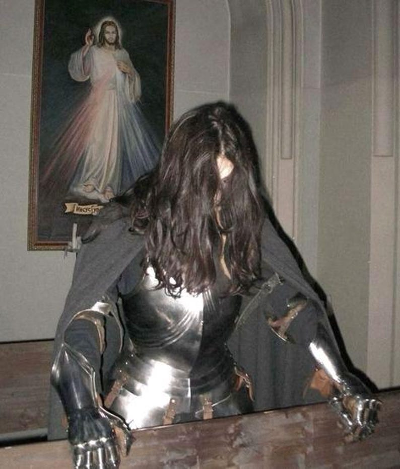 Complete female knight armor set with leg armor, breastplate, and gauntlets
