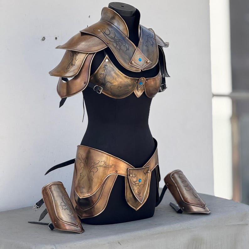Handmade female medieval armor suit made from polished steel and leather for fantasy cosplay