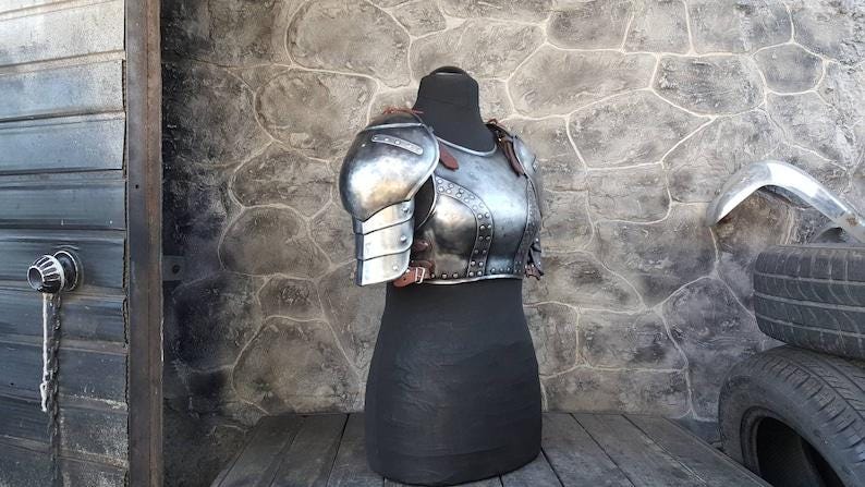 Female Witcher LARP armor suit side profile with polished steel finish