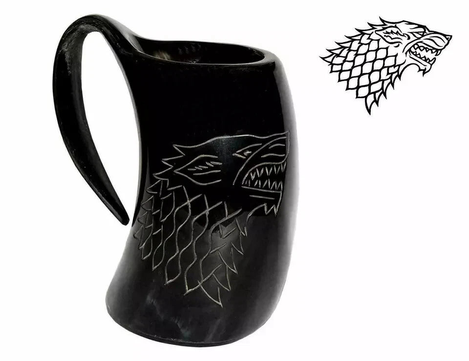 Side angle of handcrafted Viking drinking horn mug with wolf carving from Game of Thrones inspired design