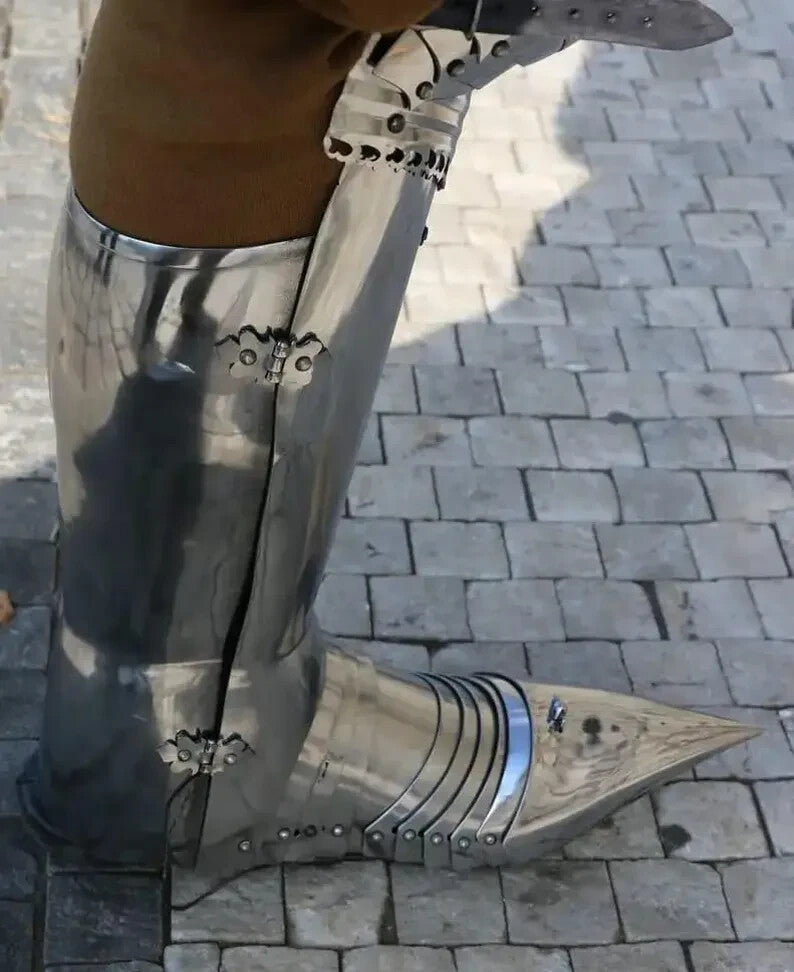 Foot protection detail of Gothic Armor Suit – Steel plated greaves and sabatons by Artisans Hub