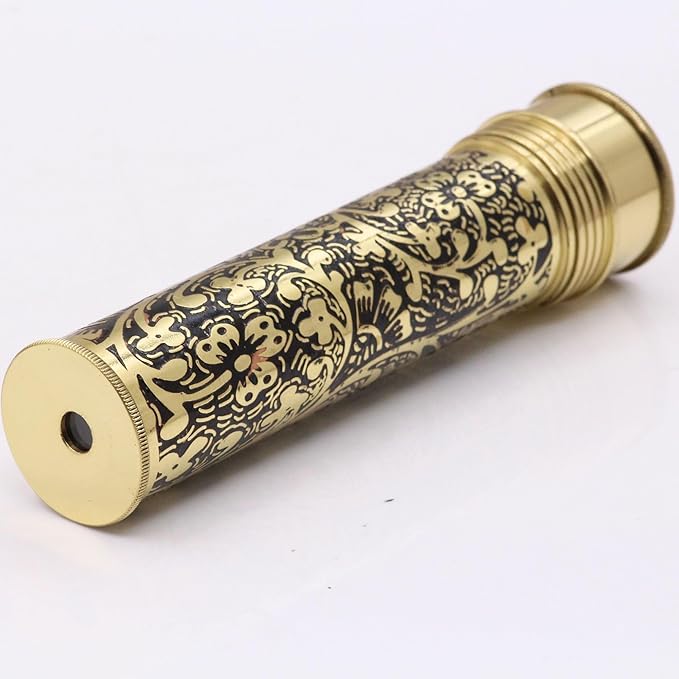 Elegant handcrafted brass kaleidoscope displayed on a polished wooden base