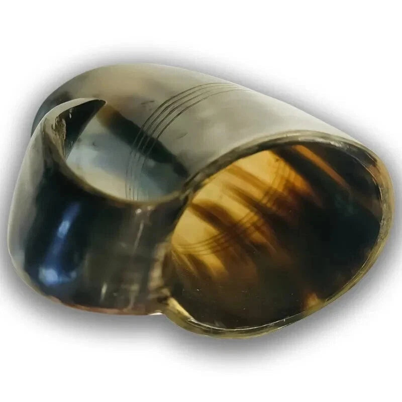 Close-up of handcrafted vintage Viking horn mug details