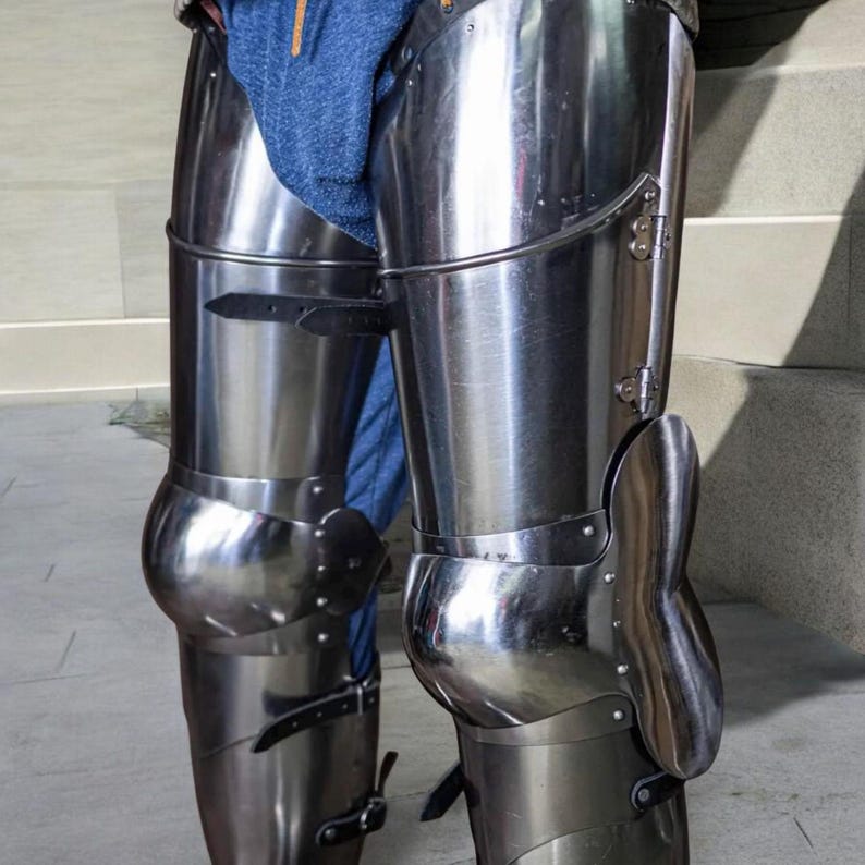Handmade steel greaves, cuisses, and poleyns for authentic SCA reenactment armor