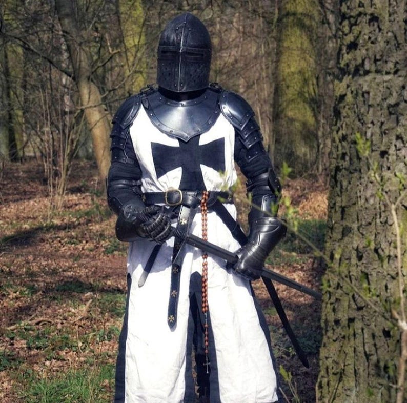 templar larp costume with full body armor and shoulder plates