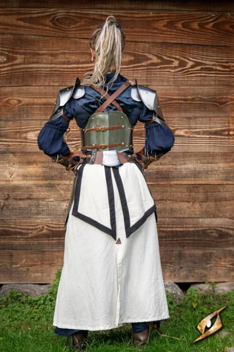 Back view of medieval female armor showing strapping and fit