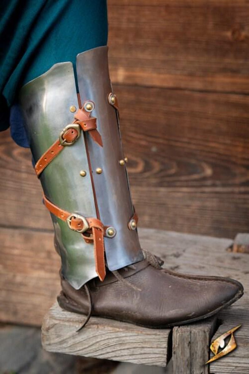 Polished steel female knight costume with adjustable leather straps