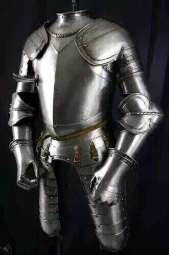 Close-up showing polished steel chestplate, intricate armor detailing, and leather interior gloves from the Artisans Hub medieval armor suit.