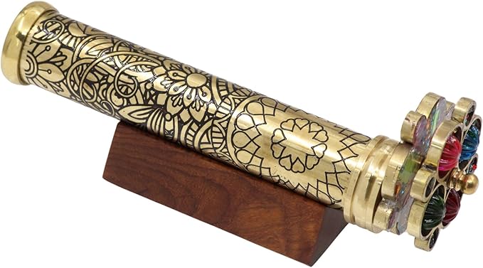 Lacquered brass kaleidoscope with black patina finish and acid-etched floral pattern