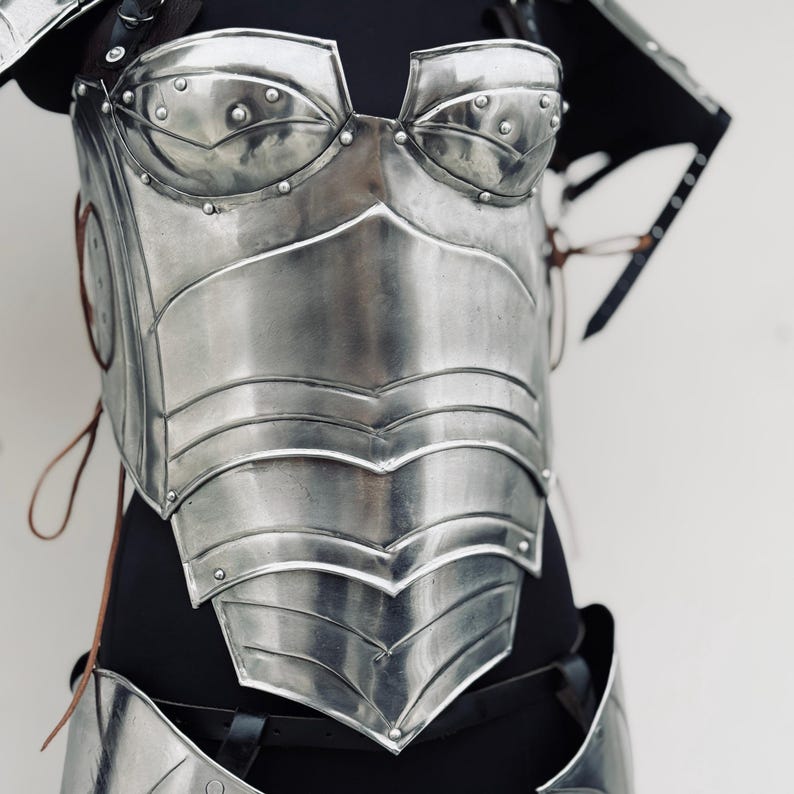 Back view of Lady Elf Warrior Armor Suit featuring tassets, greaves, and adjustable leather belts