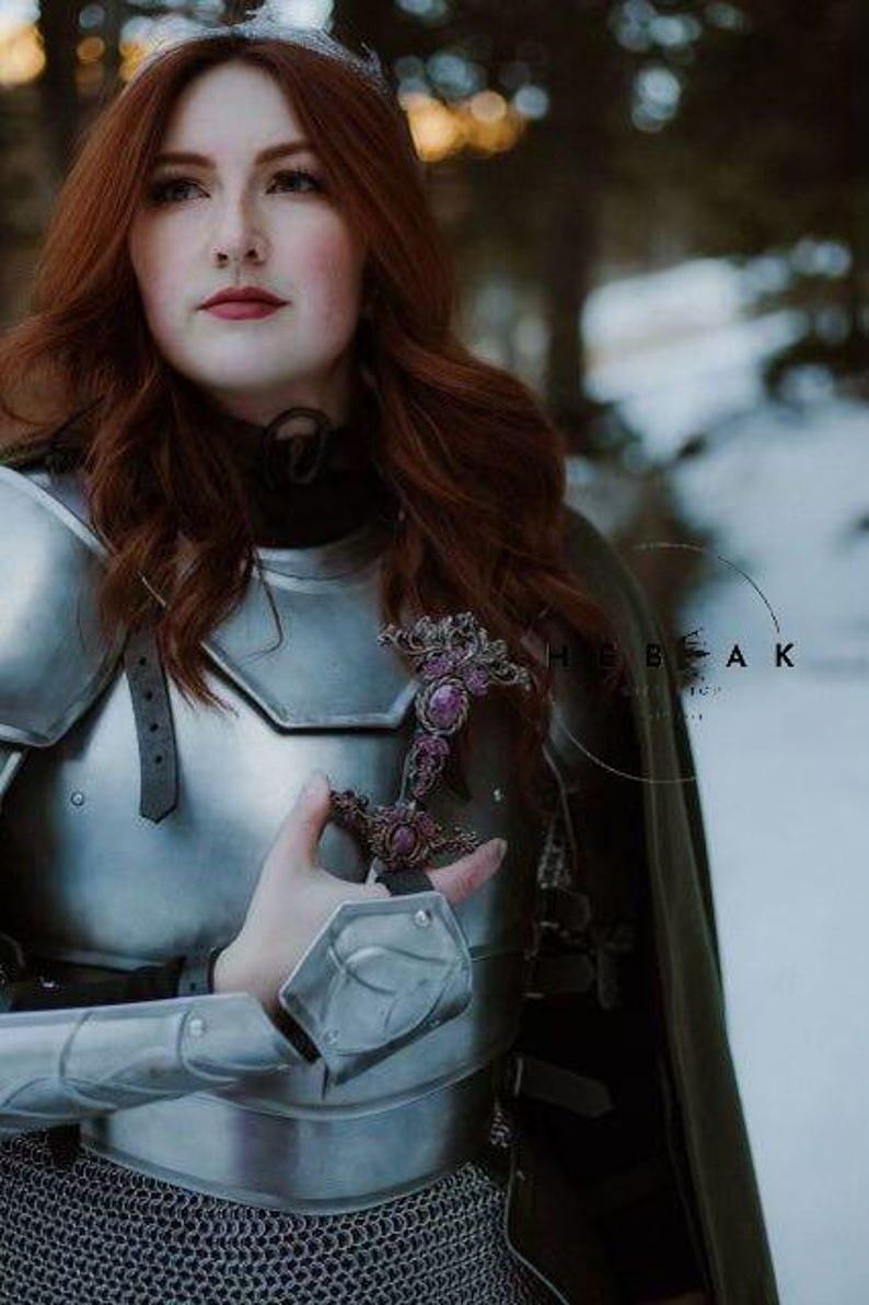 Detailed view of the contoured breastplate and tassets offering stylish and protective fit for female fantasy warrior costumes.