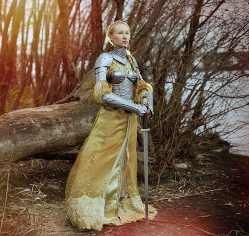 Side view of LARP female armor showing pauldrons and bracers