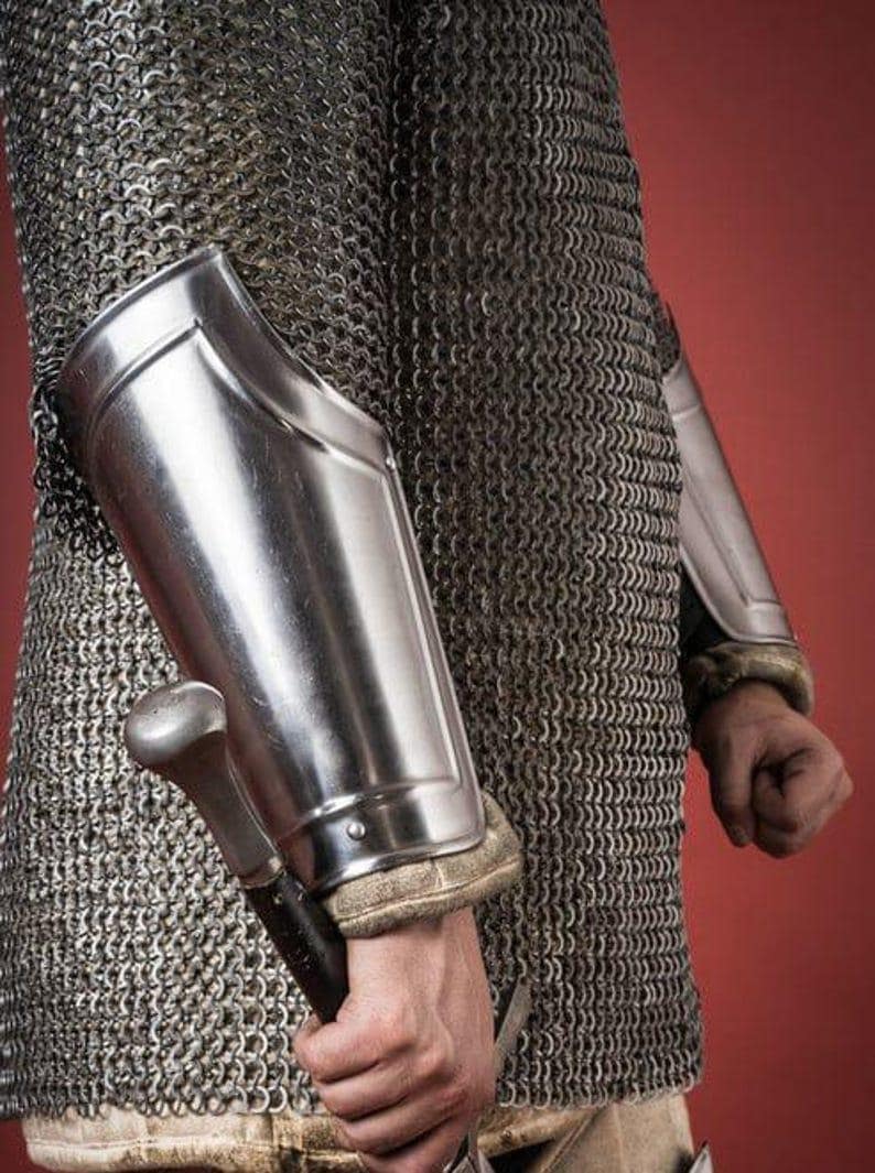 Medieval leg armor set with greaves, cuisses, and bracers designed for LARP, cosplay, or reenactment.