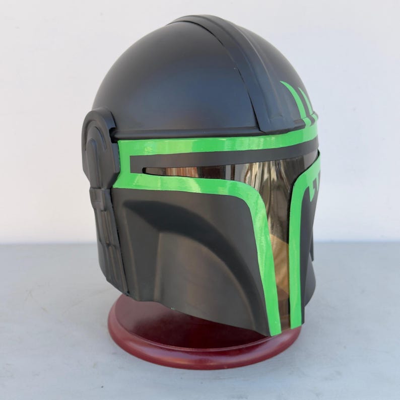 Side profile of Mandalorian steel helmet replica inspired by Boba Fett armor