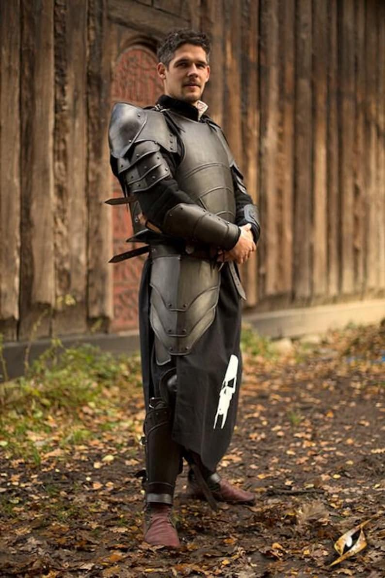 Back view of medieval cosplay armor showing adjustable leather belts
