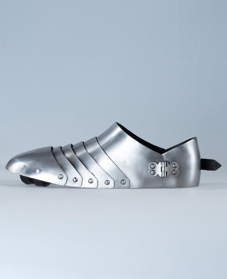 Close-up of Medieval blunt toe sabatons crafted in 18 gauge mild steel