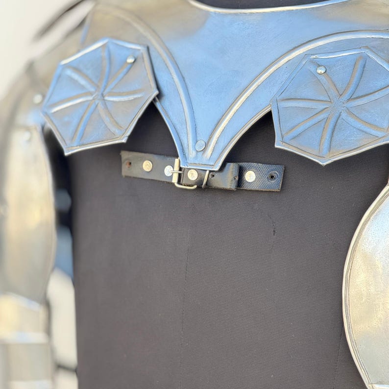 Close-up of rolled edges on Medieval Battle Knight steel pauldrons for safety and comfort