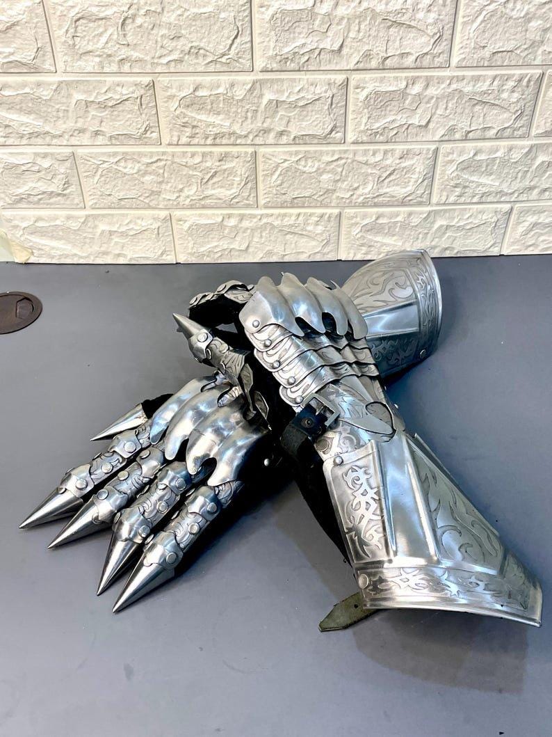 Pair of medieval Gothic gauntlet gloves with engraved detail, perfect for fantasy roleplay