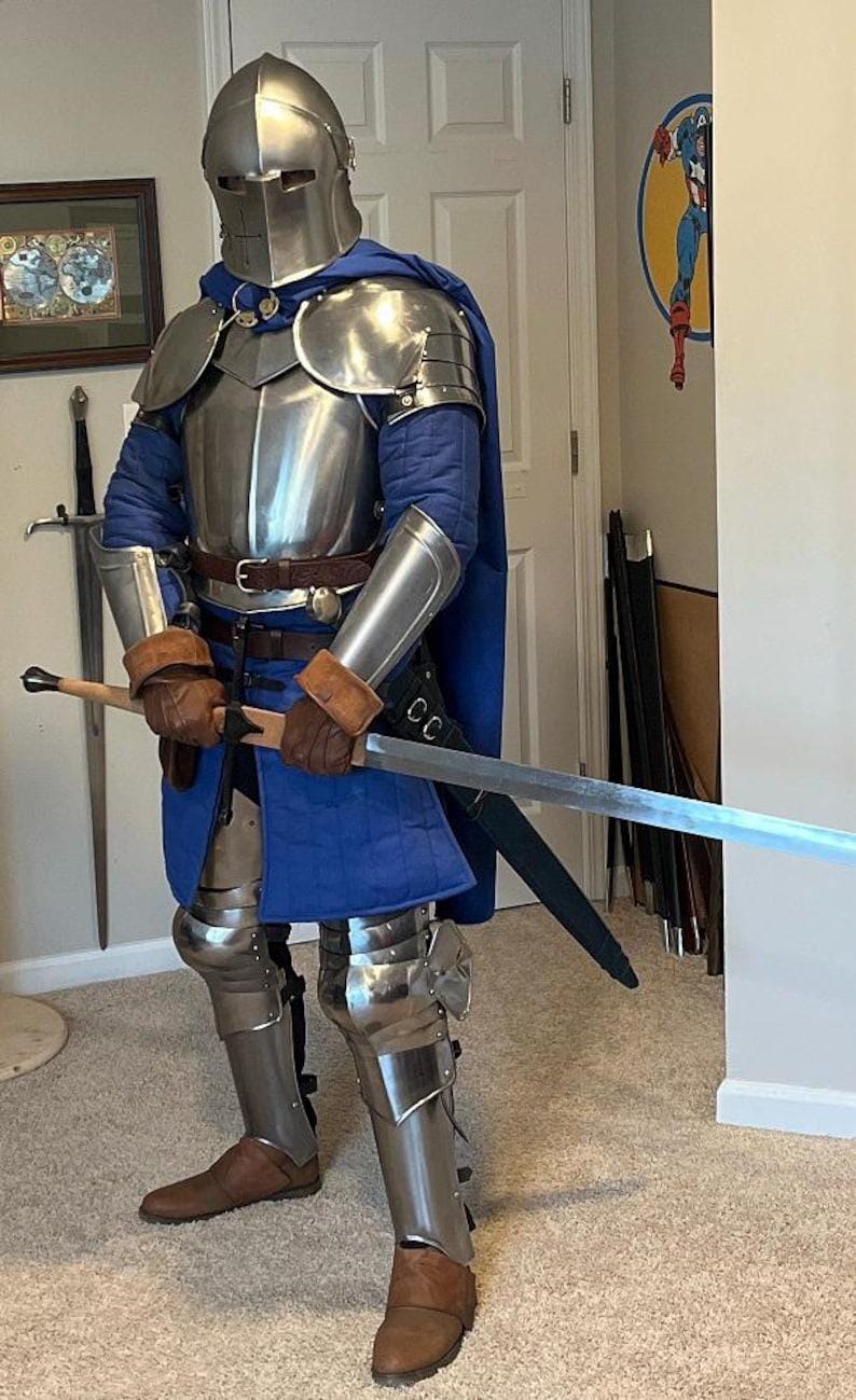 Medieval knight armor featuring cuirass, pauldrons, and gorget for upper body protection.